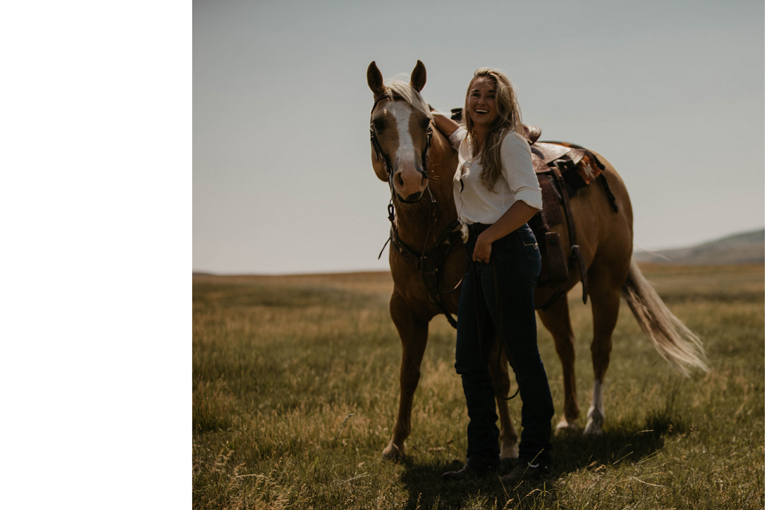 Marie Fraser standing with her horse